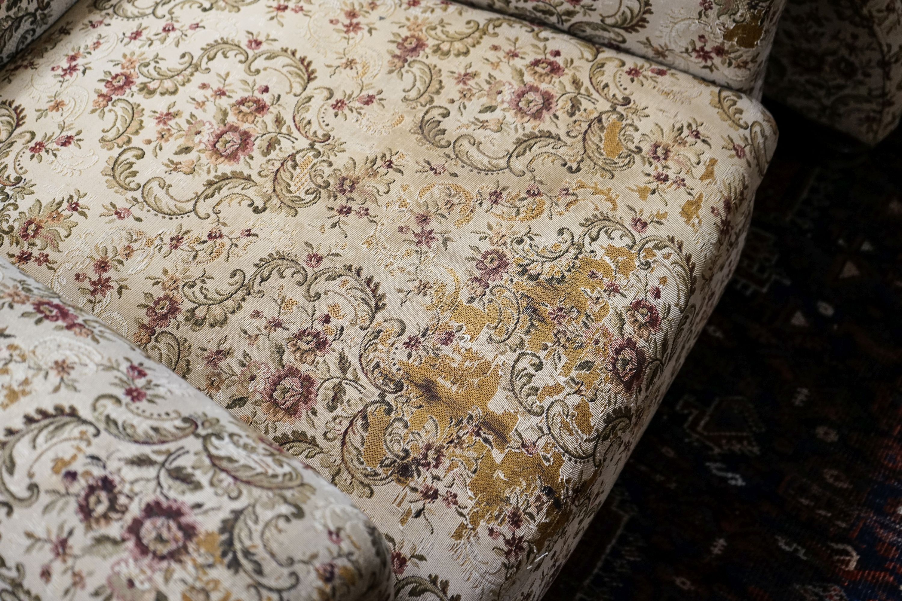 A near pair of late Victorian upholstered armchairs, width 88cm, depth 86cm, height 96cm